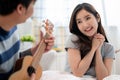 Wonderful young asian couple on bed in bedroom hug and enjoy life together and smiling tender couple hugging in bed in the morning Royalty Free Stock Photo