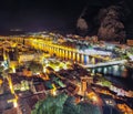 Wonderfull aerial panoramic view of Old Town Omis , Cetina river and mountains at night Royalty Free Stock Photo