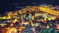 Wonderfull aerial panoramic view of Old Town Omis , Cetina river and mountains at night Royalty Free Stock Photo