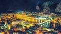 Wonderfull aerial panoramic view of Old Town Omis , Cetina river and mountains at night Royalty Free Stock Photo