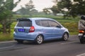 Blue Honda Jazz or Honda Fit GD1 on the road Royalty Free Stock Photo