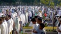 Eid al-Fitr prayer performed by Indonesian Muslims in a field