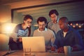 They wont stop until they find the solutions they need. a group of designers working late in an office. Royalty Free Stock Photo