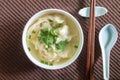 Wonton shrimp dumpling in clear soup with coriander on top Royalty Free Stock Photo