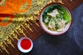 wonton soup or pangsit or dumplings soup and vegetable. wonton is traditional Chinese food of minced meat wrapped in flour sheets Royalty Free Stock Photo