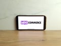 WooCommerce logo displayed on mobile phone