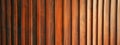 Wood background banner panorama long - Brown wooden acoustic panels wall texture, AI