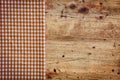 Wood background with checked napkin