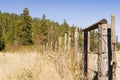 Wood and barb wire fence Royalty Free Stock Photo