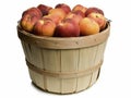 Wood basket with peaches Royalty Free Stock Photo