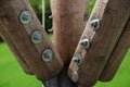 Wood beams connected by metal and nut Royalty Free Stock Photo