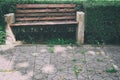 wood bench beside pathway in public park Royalty Free Stock Photo