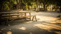 Wood bench and table on the sand beach with tree tropical paradise on sunny light