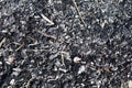 Wood black charcoal in a background composition Royalty Free Stock Photo