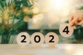 Wood block circle with 2024. Happy New Year. Merry Christmas. Goal planning idea. Popular trends Royalty Free Stock Photo