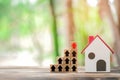 Wood block stacking as step stair and model house, business growth to success. Royalty Free Stock Photo