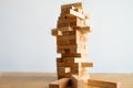 Wood block tower with architecture model, Concept Risk of management and strategy plan, growth business success process Royalty Free Stock Photo