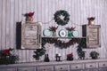 Wood board table in front of Christmas warm gold garland lights on wooden rustic background