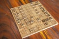Wood board of japanese chess or Shogi board game on wooden table for thai people player playing competition match at Wat Khao Din