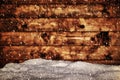 Wood board and mound of snow. Snowing blizzard.