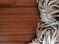 Wood board with textile laces