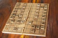 Wood boards of japanese chess or Shogi strategy board game on wooden table for thai people player playing and competition match at