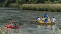 Wood boats and kayak on Dunajec river with passangers Royalty Free Stock Photo