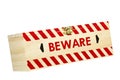 Wood Box with Red Chevron Worded Beware Royalty Free Stock Photo