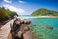 Wood bridge on brown rock and beautiful sand beach and clear sea water at nang yuan in koh tao thailand on beautiful nature lands