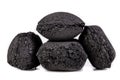 Wood briquette used for grilling meat. Pressed charcoal for smoking in the grill