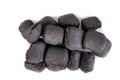 Wood briquette used for grilling meat. Pressed charcoal for smoking in the grill