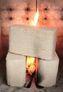 Wood briquettes burning in stove