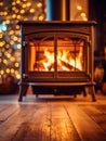 Wood burning stove in front of a christmas tree