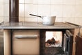 wood-burning stove in the kitchen of ancient home Royalty Free Stock Photo