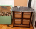 Wood burning stove in a kitchen of a mountain home and the axe 2