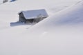 Wood cabin in deep snow Royalty Free Stock Photo