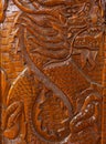 Wood carving of a dragon Royalty Free Stock Photo
