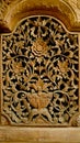 Wood carving, floral pattern carved on wooden background. gebyok.