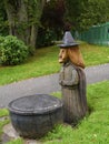 A wood carving of a Pendle Witch