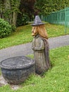A wood carving of a Pendle Witch