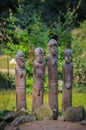 Wood carving of primitive various African men Royalty Free Stock Photo