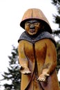 Wood carving of Qualicum Bay First Nations woman overlooking the sea