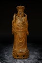 Wood Carving Statue of Prosperity Money God Royalty Free Stock Photo