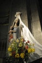 Wood carving of the virgin with bouquet of flowers, Eglise Saint Pothin