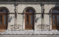 Wood Castle Doors On Stoned Wall And Chess Like Floor