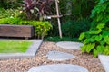 wood chair in the garden, view of garden patio, peaceful Garden with a Freshly Lawn Royalty Free Stock Photo