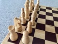 Wood chess set board and cream pieces