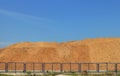 Wood Chip Mountain under Clear Sky
