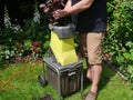 Man using Wood chipper machine Royalty Free Stock Photo
