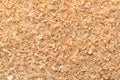 Wood chips, coarse sawdust, close-up, surface from above, small chippings of wood